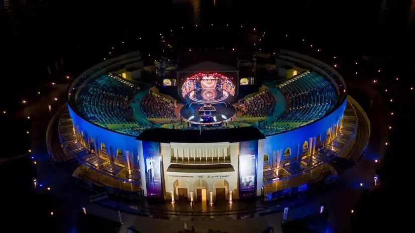 Concert crowd at Al Majaz Amphitheatre at night